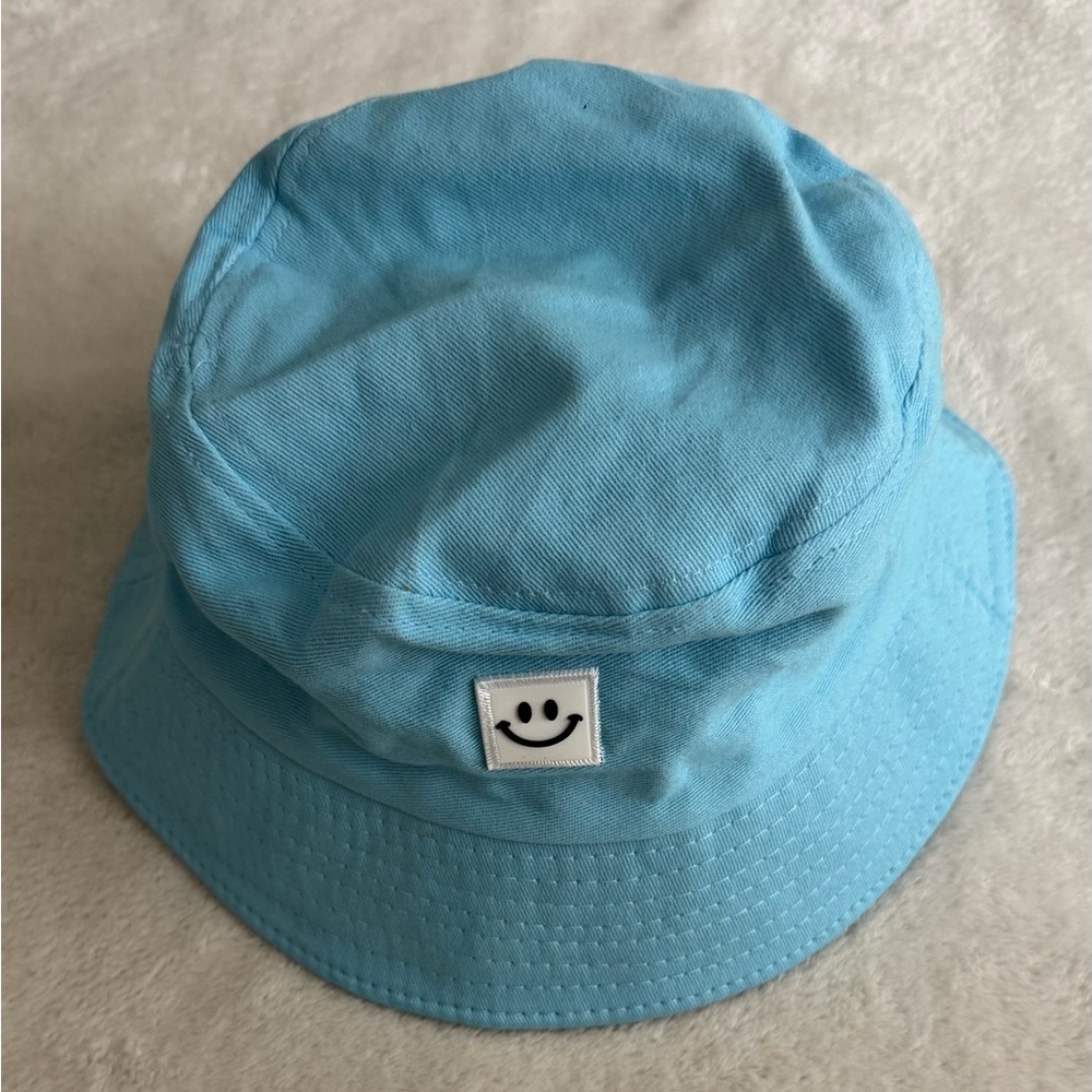 Blue Bucket Hat with Smiley Patch